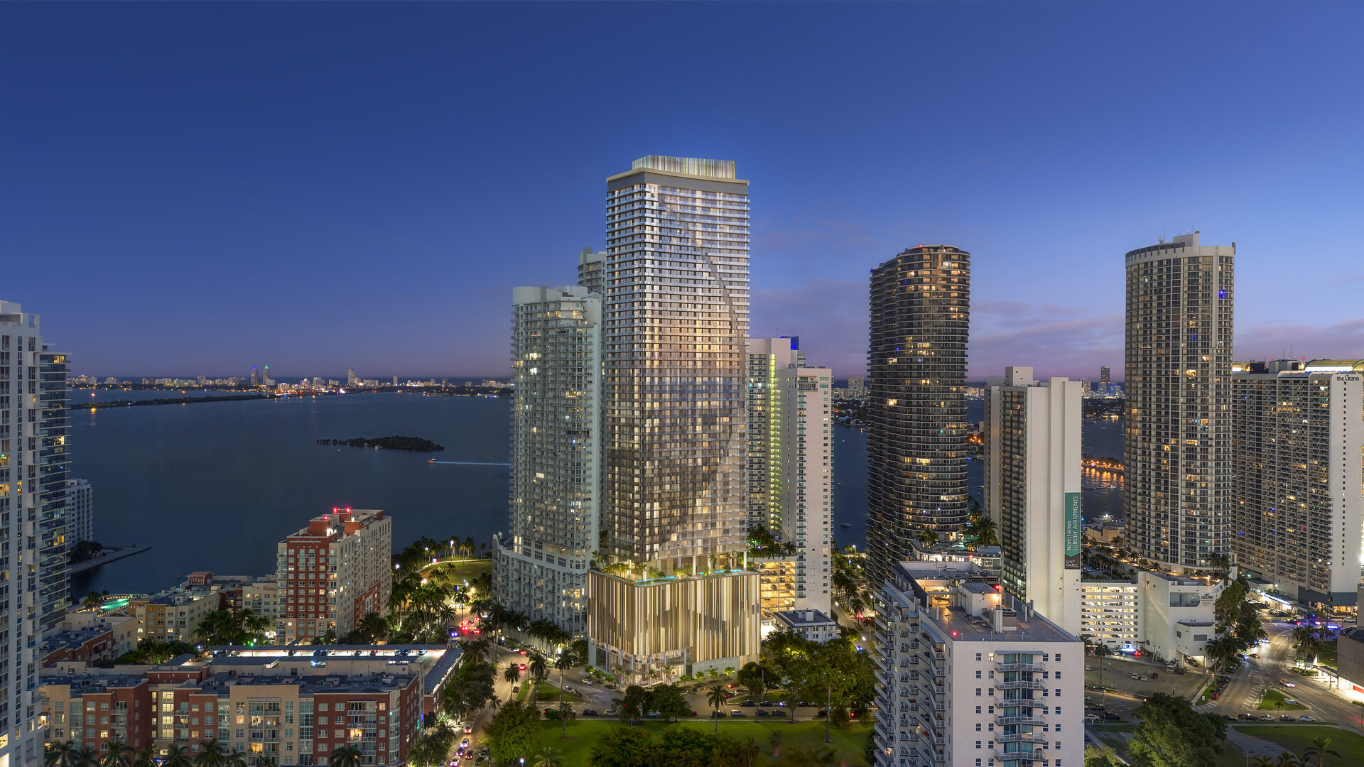 Edge House Miami, tower and neighboring buildings at night, developer rendering